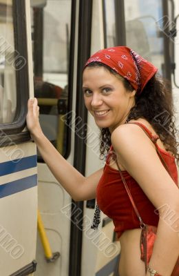 woman getting on bus