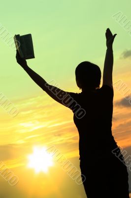 female praying with bible #3 female praying with bible #3