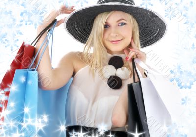 portrait of blonde in hat with shopping bags
