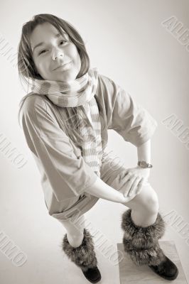 young happy woman in striped muffler