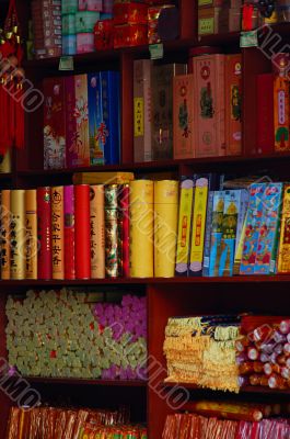 Aroma sticks on shelves in buddhist shop