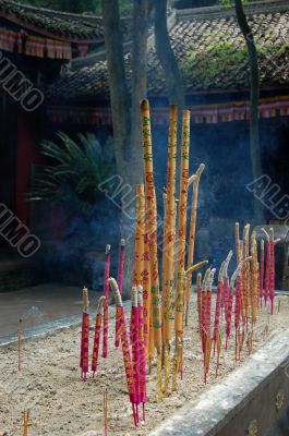 Burning aroma sticks in buddhist church