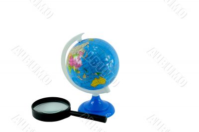 The globe and magnifying glass