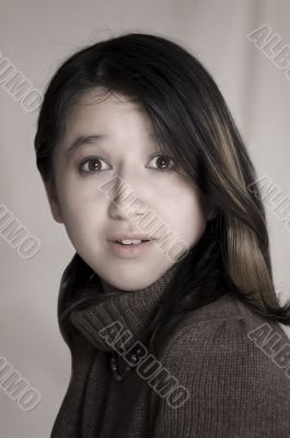 young woman looking in wide-eyed astonishment