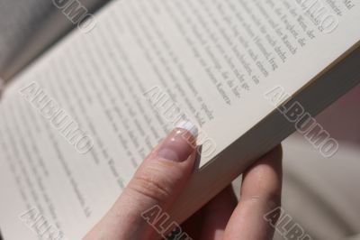 Open book and french manicure