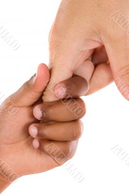 Two hands of different races together
