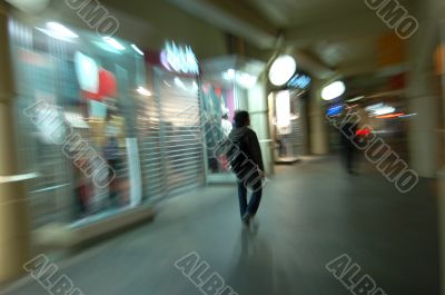 Lonely man  in blurred city