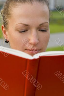 woman with red book