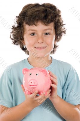 Adorable boy with pink piggy bank