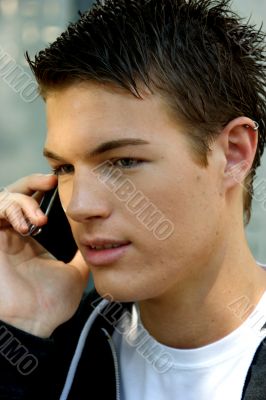 Portrait of a young man with mobile phone Portrait of a young man with mobile phone