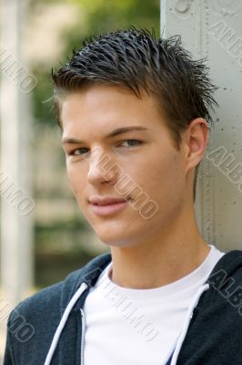 Portrait of a young man in white shirt