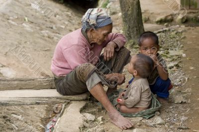 Asia, old woman with grandchildren