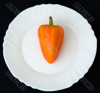 sweet pepper on a white plate