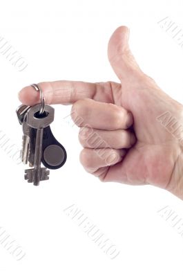 hand and key close up