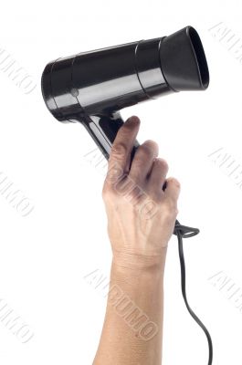 hand with hair drier