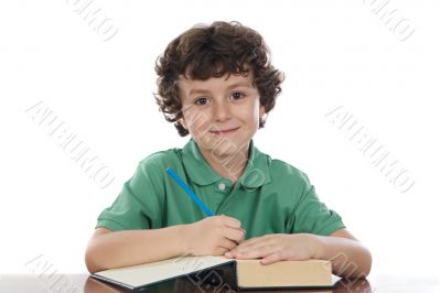 Adorable child write in book