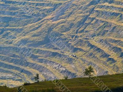 terraces of open-pit mine.