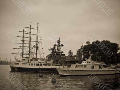 Sailing boat and warship