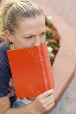 woman with red book