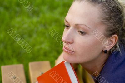 attractive woman with red book