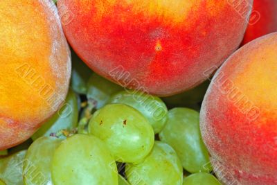 appetizing bunch of grapes and peach appetizing bunch of grapes and peach
