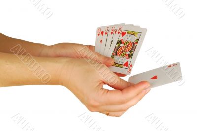  womanish hand holds a playing cards