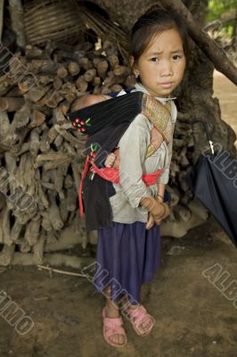 Hmong girl with brother, Laos