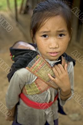 Hmong girl with brother, Laos