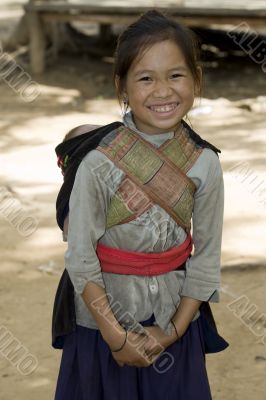 Hmong girl with brother, Laos