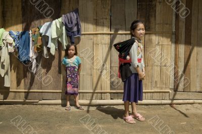 Hmong girl with brother, Laos