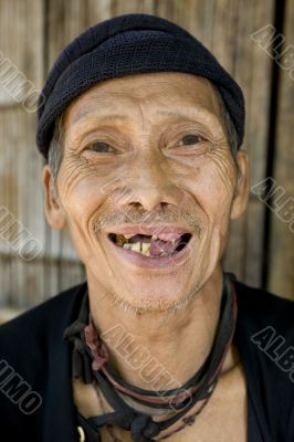 laughing old man with bad teeth, Laos