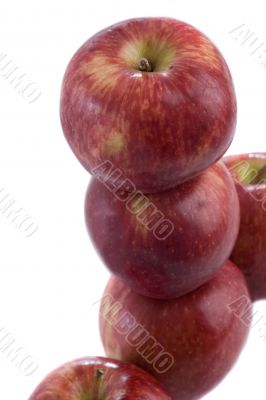 Several apples stacked balance with a view from above
