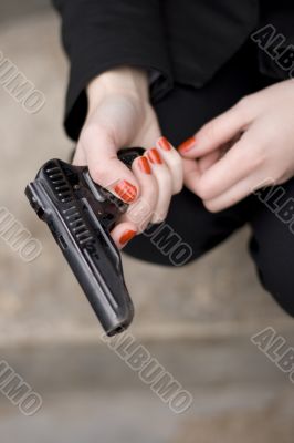 gun in female hands
