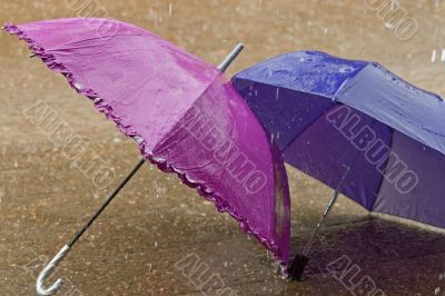 Umbrella at intense rainy weather