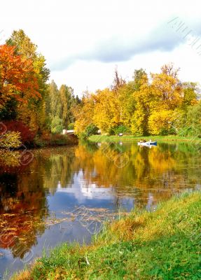 Picturesque pond in autumn day