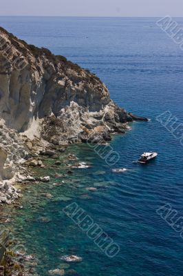 Sea view with rocks and boat