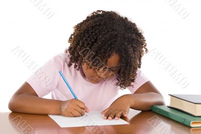 Adorable african girl writing