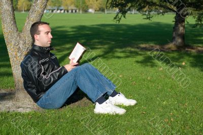 Man Reading Outside
