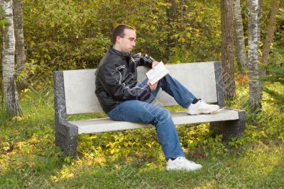 Man Reading on a Bench Man Reading on a Bench