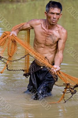Fisherman of Thailand with throw net