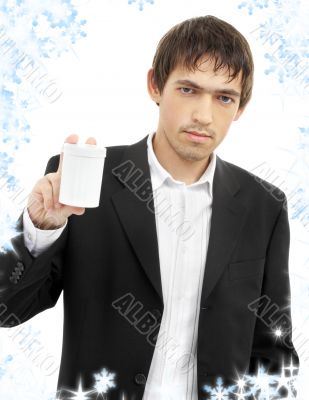 confident man showing blank medication container