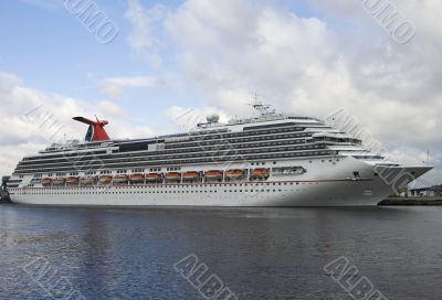 anchored commercial passenger ship on the river