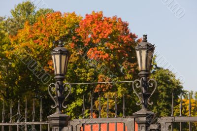 Fencing of autumn park