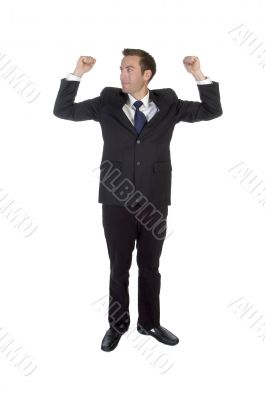 a young handsome businessman celebrating a success