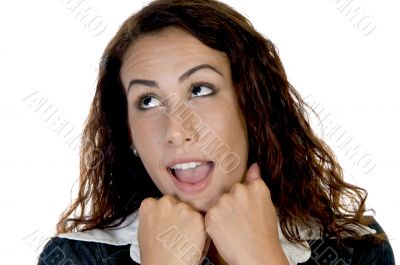 upward looking lady with chin on hands