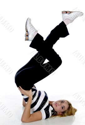 female fitness trainer raising her legs