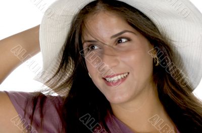 charming young model holding her hat