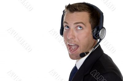 young man calling with headset and smiling