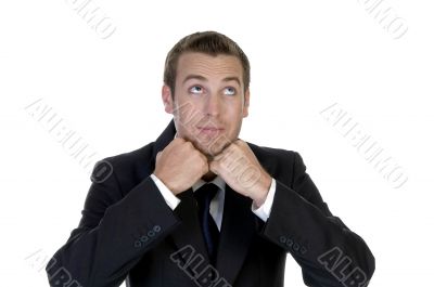 man with clenched hand and looking upside