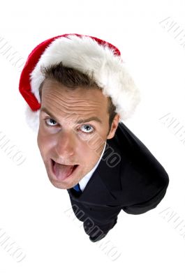 businessman wearing santa cap